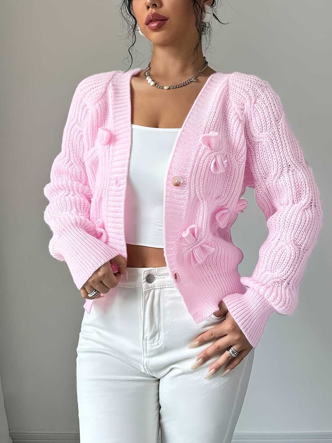 Perpetua – Bow-Detail Cable-Knit Cardigan
