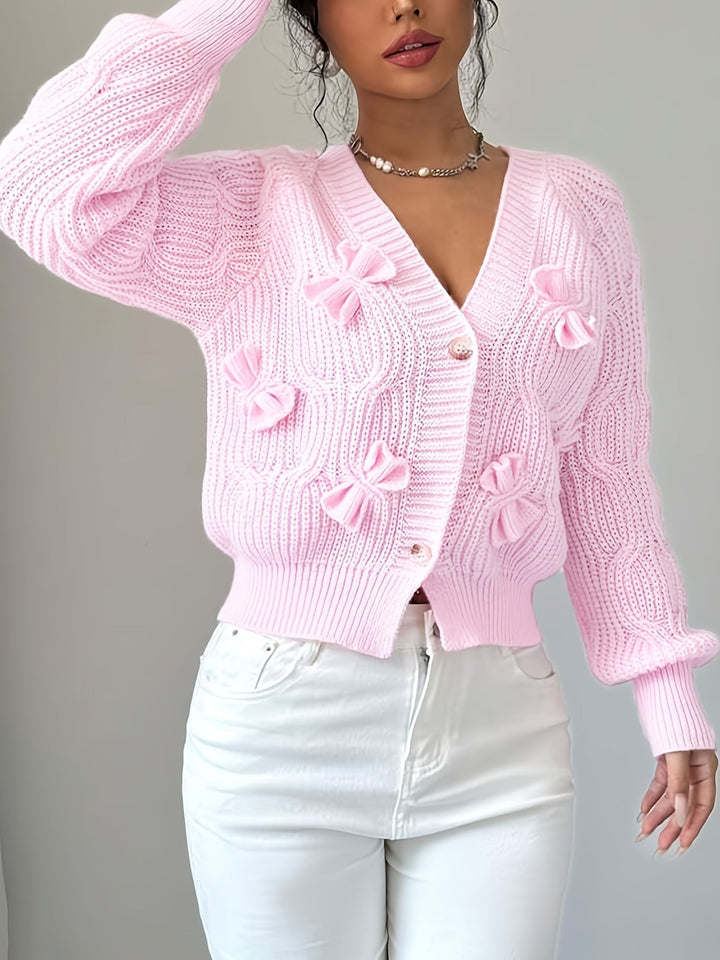 Perpetua – Bow-Detail Cable-Knit Cardigan