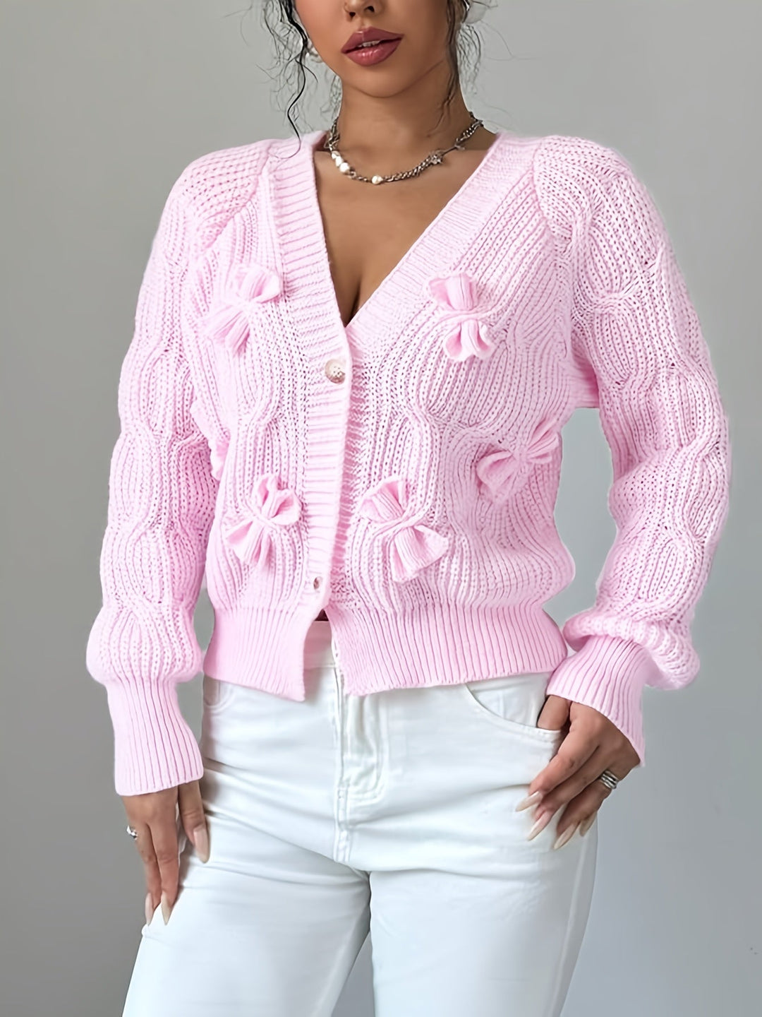 Perpetua – Bow-Detail Cable-Knit Cardigan